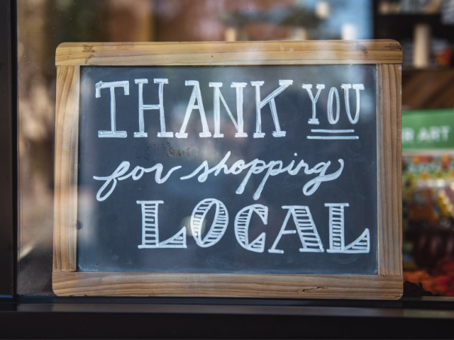 Sign saying thank you for shopping local